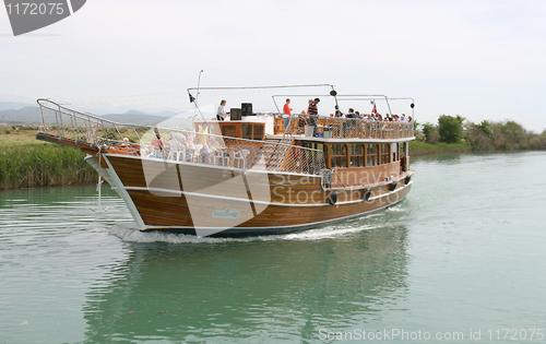 Image of Tourist boats on the river.