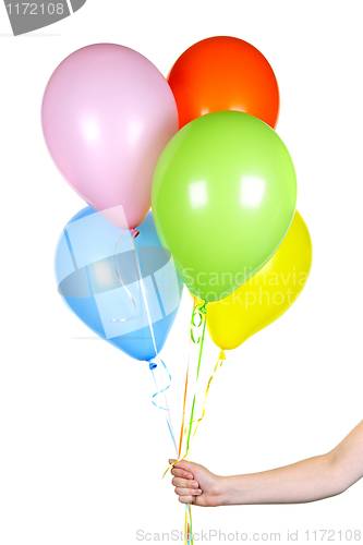 Image of Hand holding balloons on white