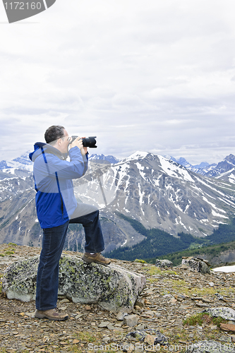 Image of Photographer in mountains