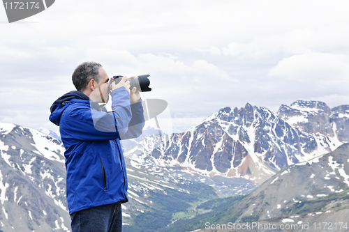 Image of Photographer in mountains