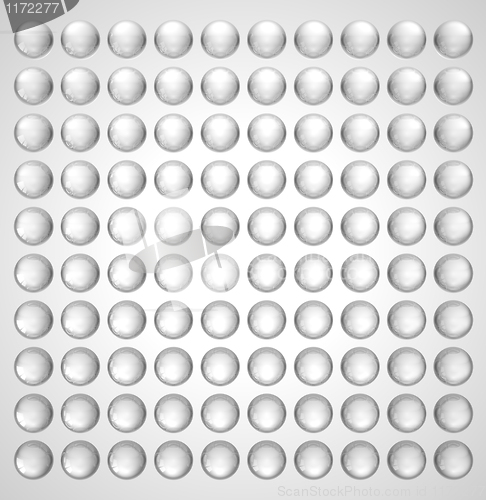 Image of Transparent spheres or beads over grey