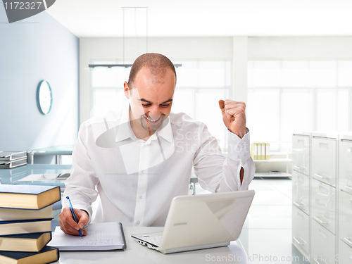 Image of man with laptop