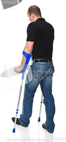 Image of man with crutch