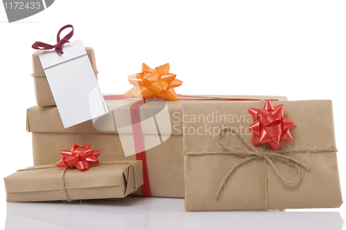 Image of gift boxes with ribbon and blank label