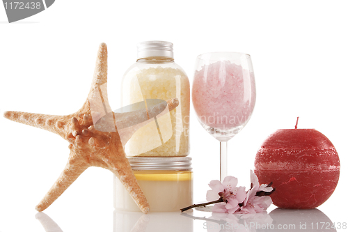 Image of Spa products, candle and cherry flower