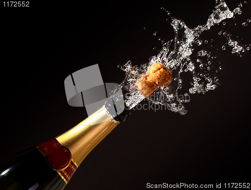 Image of champagne bottle eruption