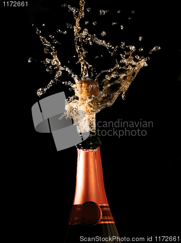 Image of champagne bottle with shotting cork