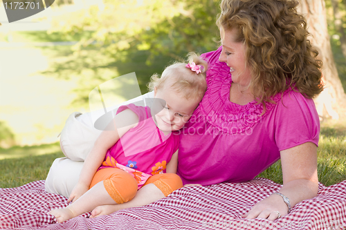 Image of Mother and Daughter on Blanket in the Park