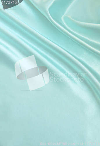 Image of Smooth elegant blue silk as background 