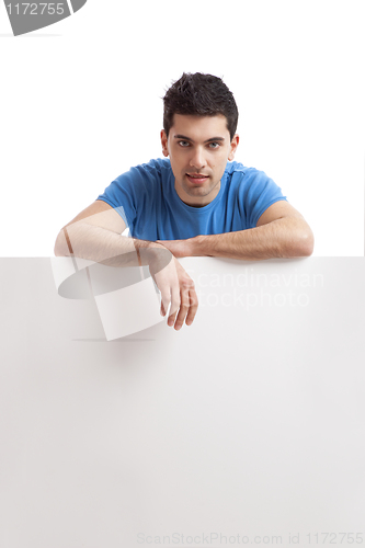 Image of Man holding a blank billboard