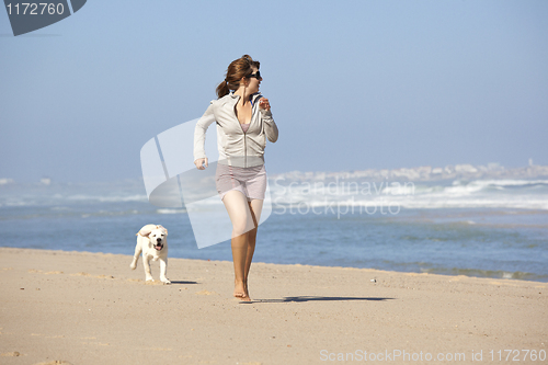 Image of Girl with her cute dog