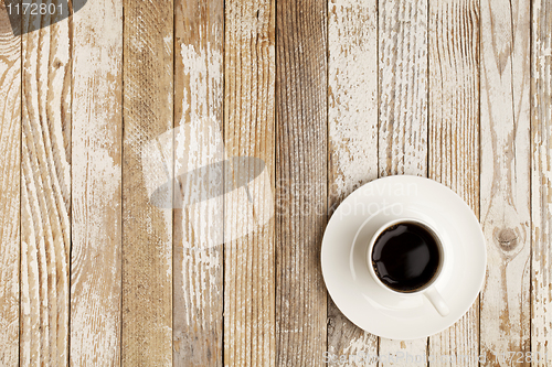 Image of coffee cup on grunge table