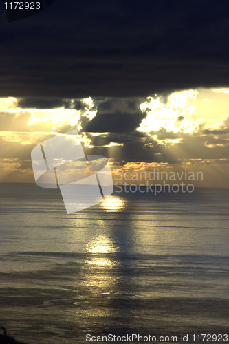 Image of dramatic spring sunset with storm front