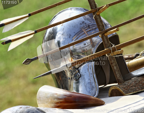 Image of ancient helmet and arrows