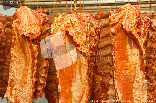 Image of Hanging smoked pork ribs