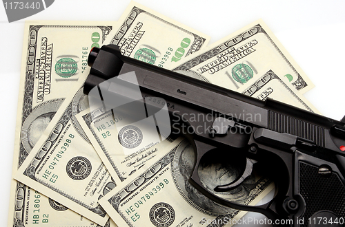 Image of pistol and dollar