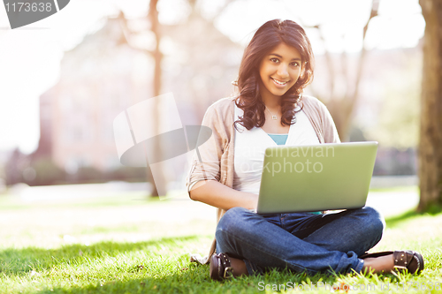 Image of Asian student on campus