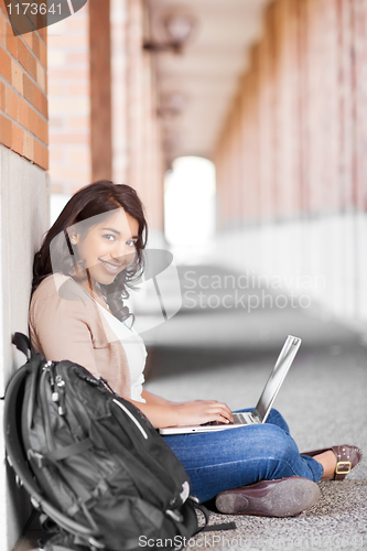 Image of Asian student on campus