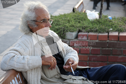 Image of Aged Turkish Man with a Cigarette