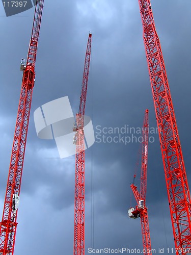 Image of Four red cranes