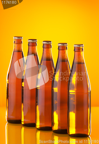 Image of Row of bottles with beer