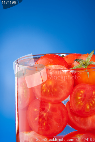 Image of Close-up of glass with tomato juice allegory