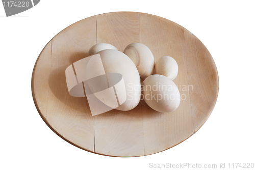 Image of turned wooden blank eggs on the dish