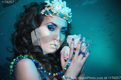 Image of Underwater queen with treasures