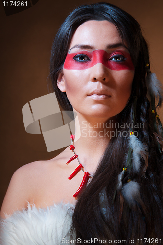 Image of American Indian with face camouflage