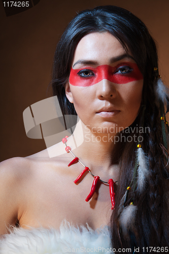 Image of American Indian with paint face camouflage