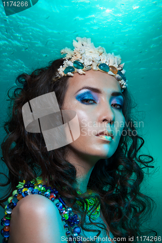 Image of Mermaid with crown of corals