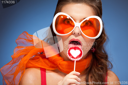 Image of Licking lollipop
