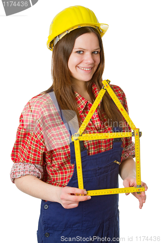 Image of Friendly craftswoman with folding rule