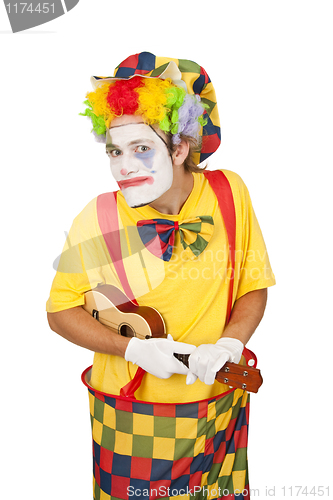 Image of Colorful clown with ukulele