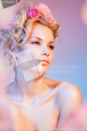 Image of Beauty shoot of a woman in roses