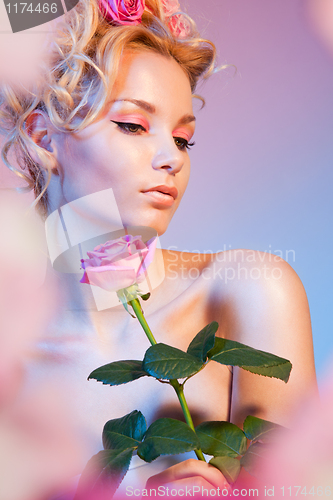 Image of Beauty shoot of a woman with rose