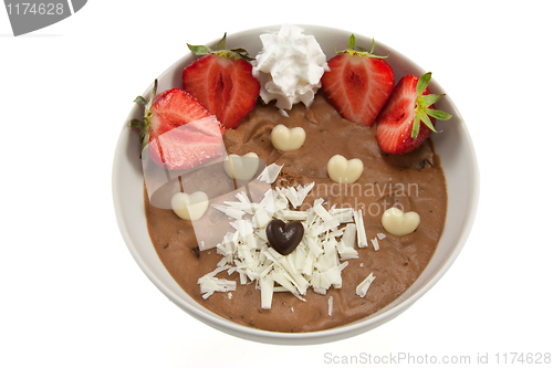 Image of Mousse with strawberries and chocolate hearts