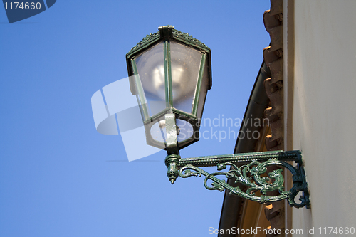 Image of the lantern on the wall in the historic