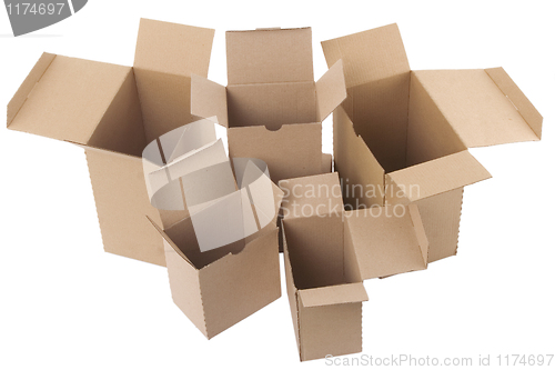 Image of open brown cardboard boxes on white background