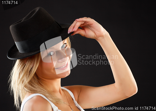 Image of Blonde in black hat.