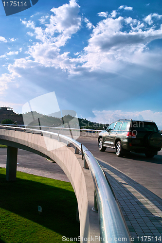 Image of Car moving on elevated road