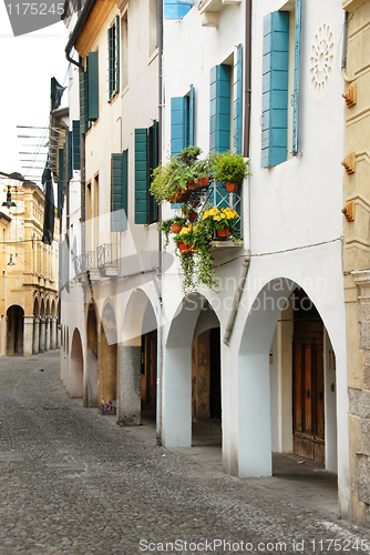 Image of Street in Italy, terrace with flowerpots