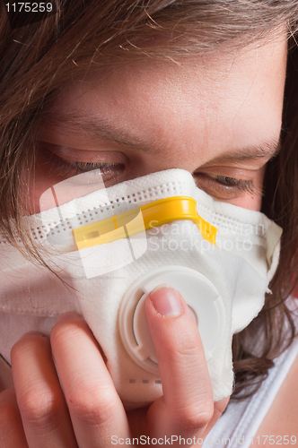 Image of Girl wearing protective mask