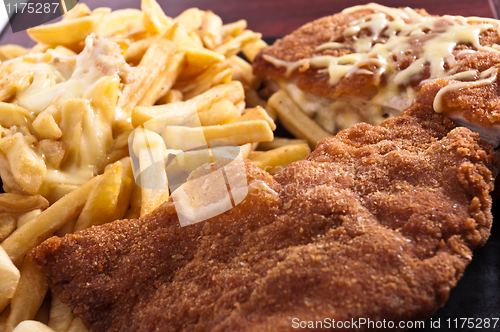 Image of Cordon bleu with fries and cheese