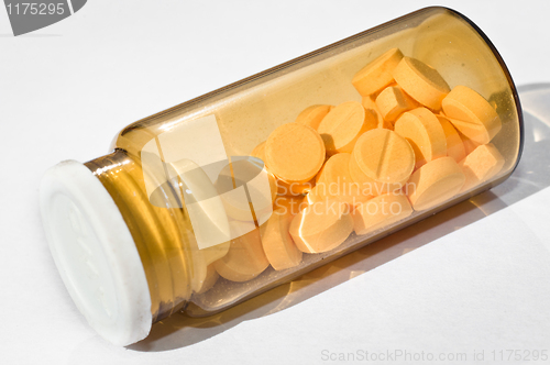 Image of Medicine bottle against white isolated background
