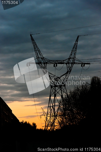 Image of Silhouette of power cables against sunset