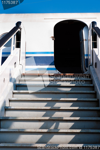 Image of opened door old plane with ramp