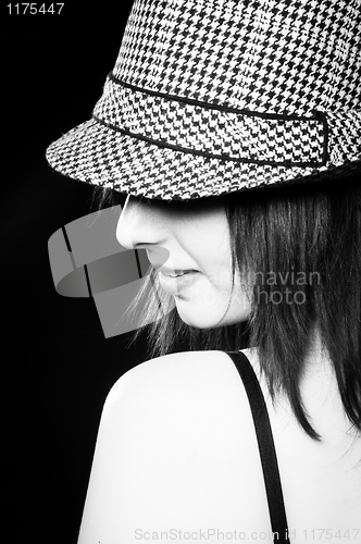 Image of Beautiful girl in sylish hat in black and white