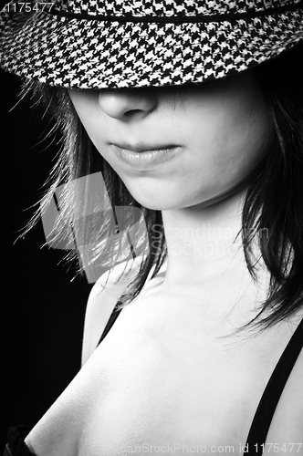 Image of Beautiful girl in sylish hat in black and white