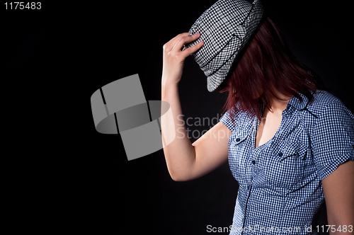 Image of Portrait of beautiful dancing girl in hat